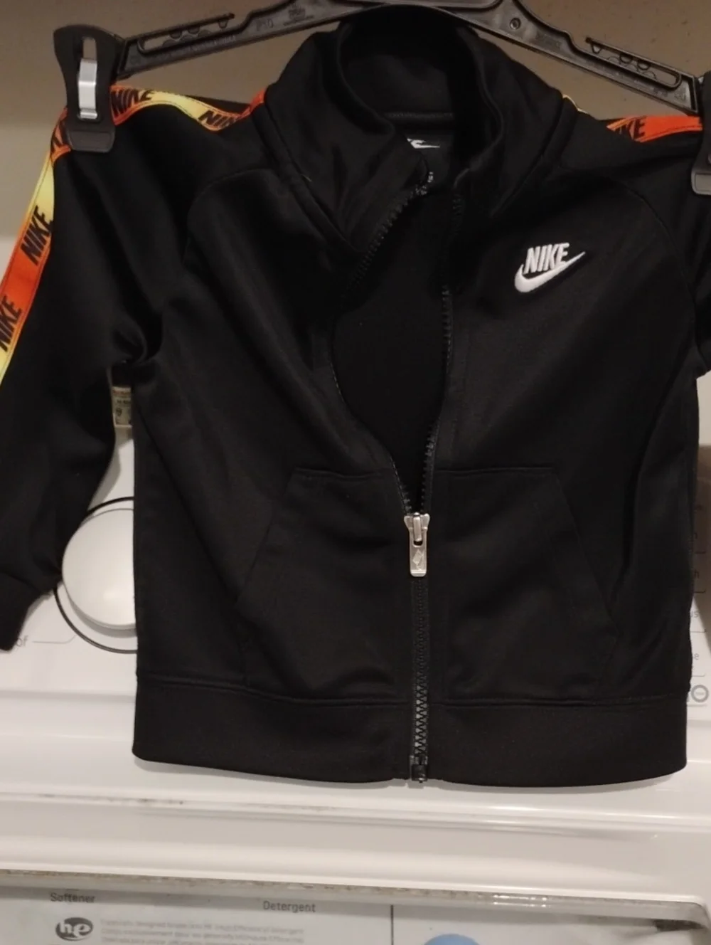 Nike Black Kids Track Jacket with Orange and Yellow Stripe